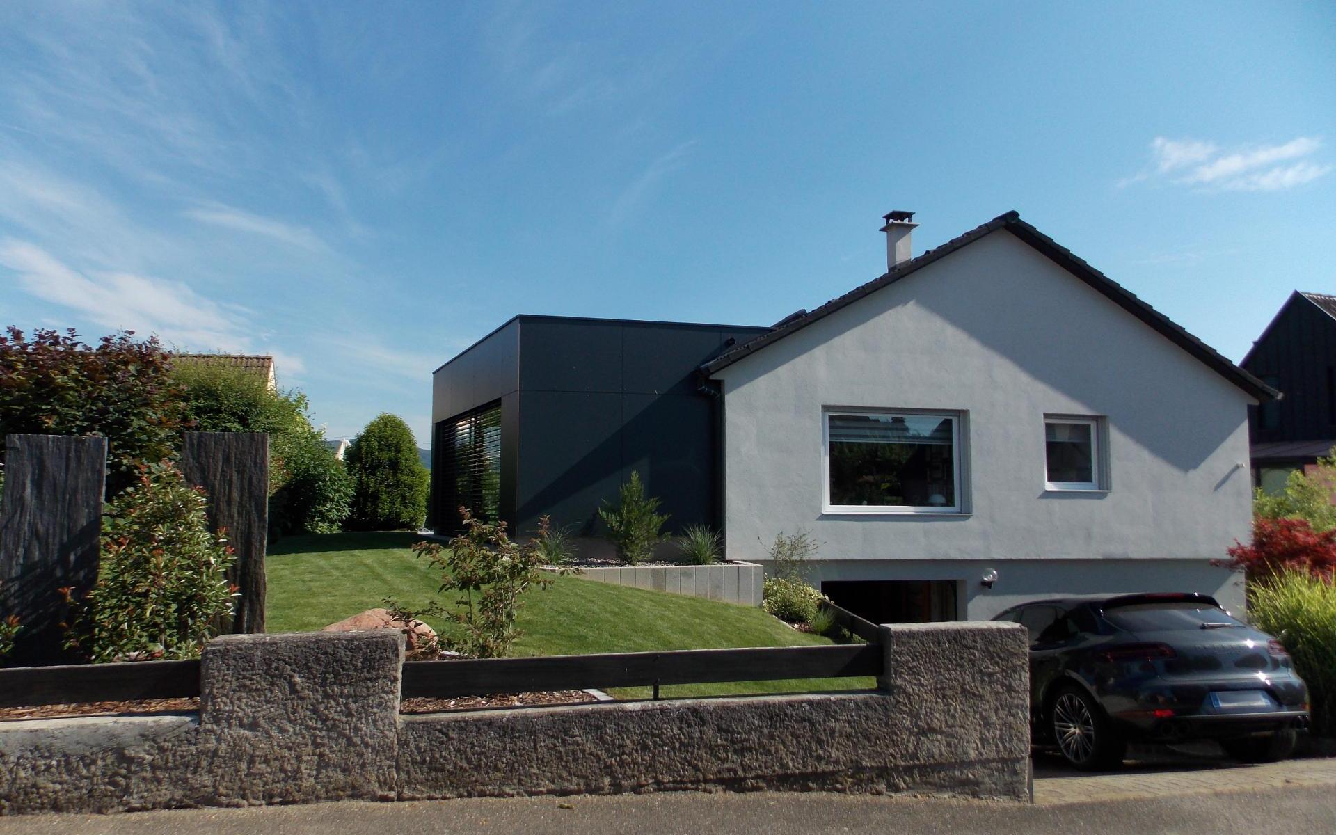 Réalisation d'une extension sur une maison particulière.